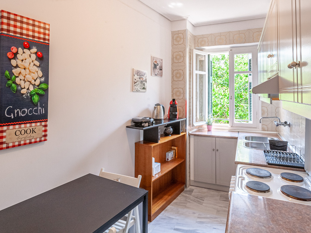 Kitchen with full-scale stove - Complete cooking facilities and essential equipment
