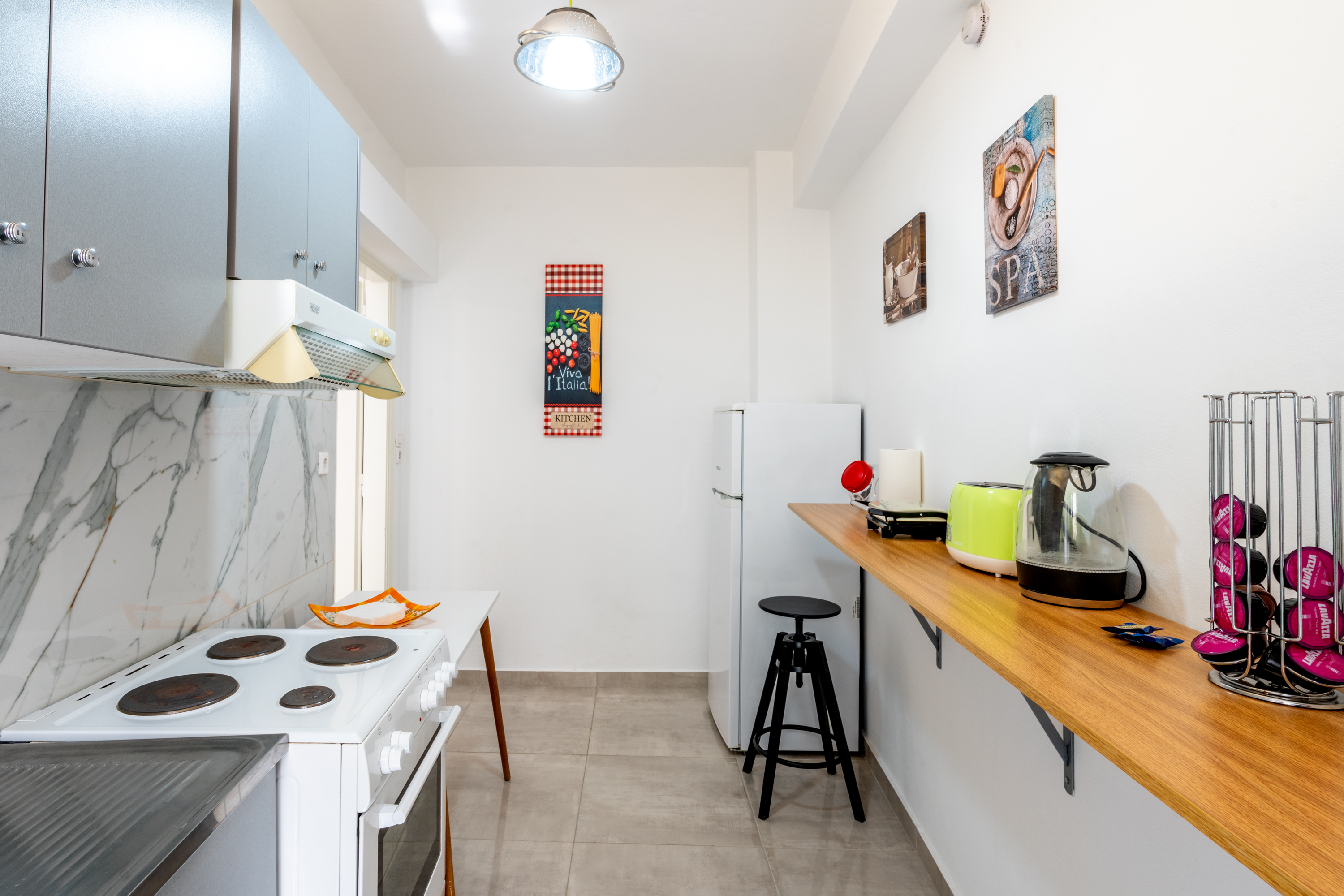 Dedicated kitchen space with modern appliances and full cooking facilities