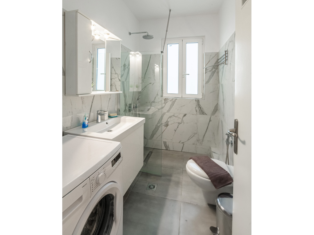 Modern bathroom with shower - Updated fixtures and comfortable design