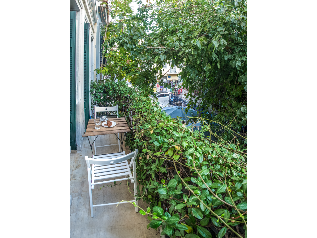 Balcony overlooking the vibrant pedestrian street - Perfect spot to experience Athens