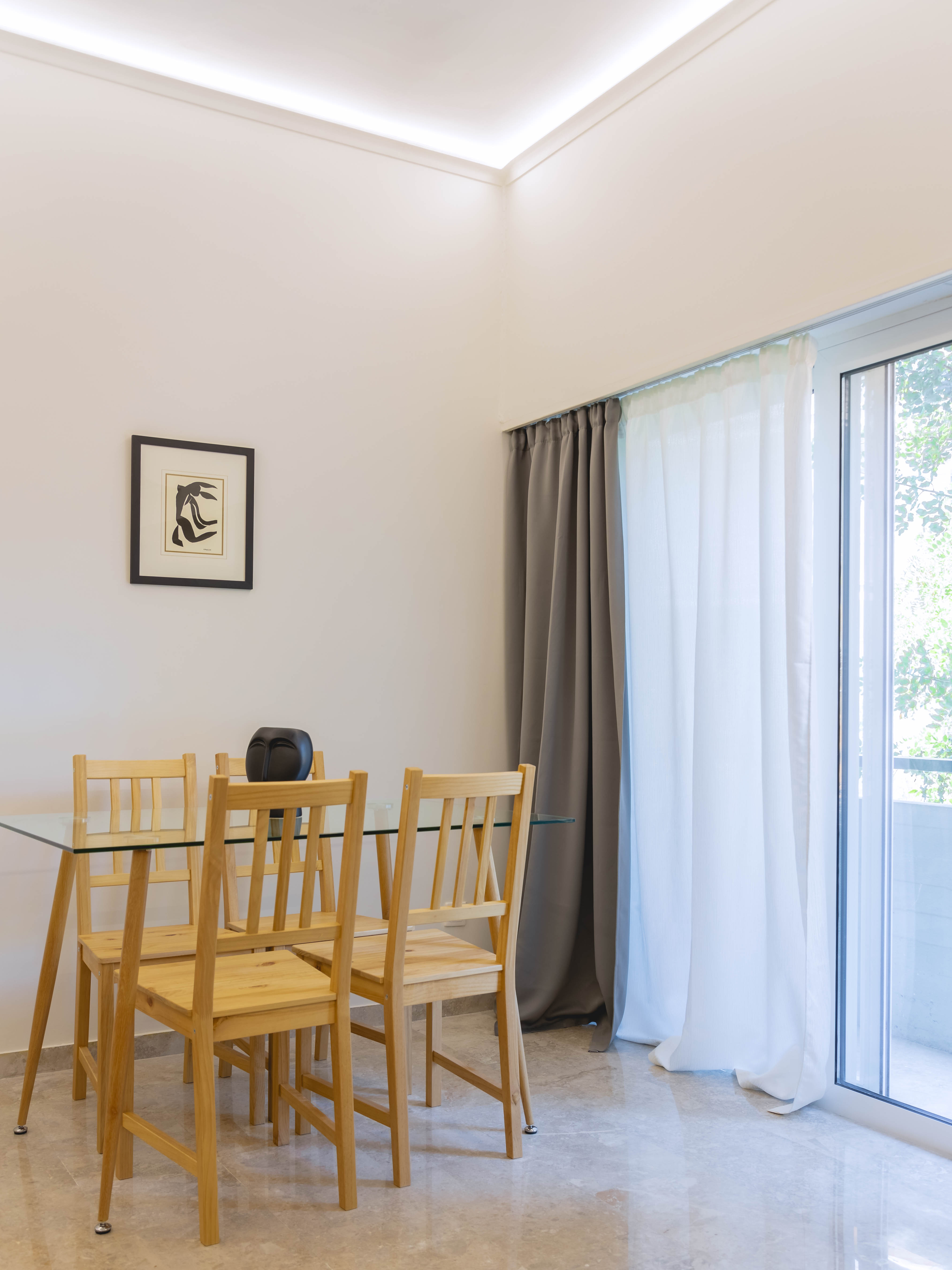 Spacious living room with dining area in Mets Gem apartment