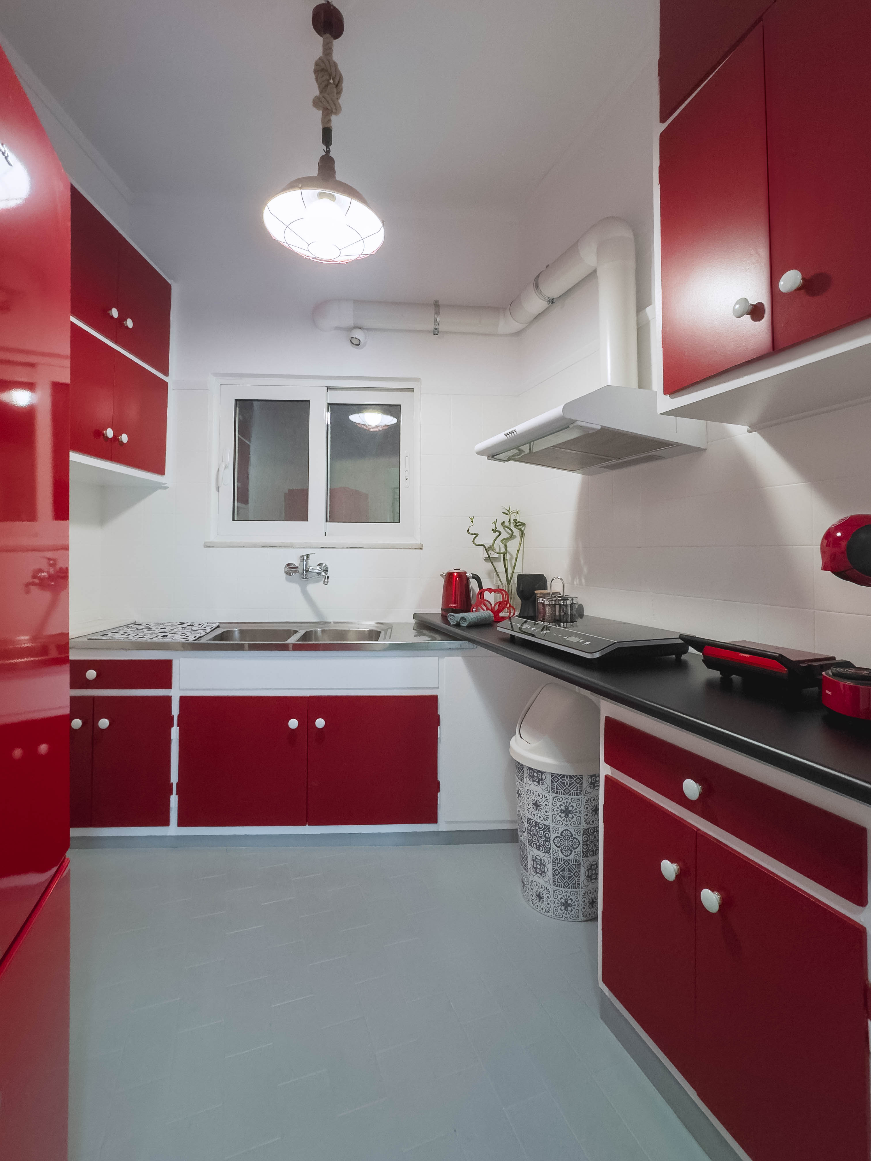 Fully equipped kitchen with modern appliances and cookware