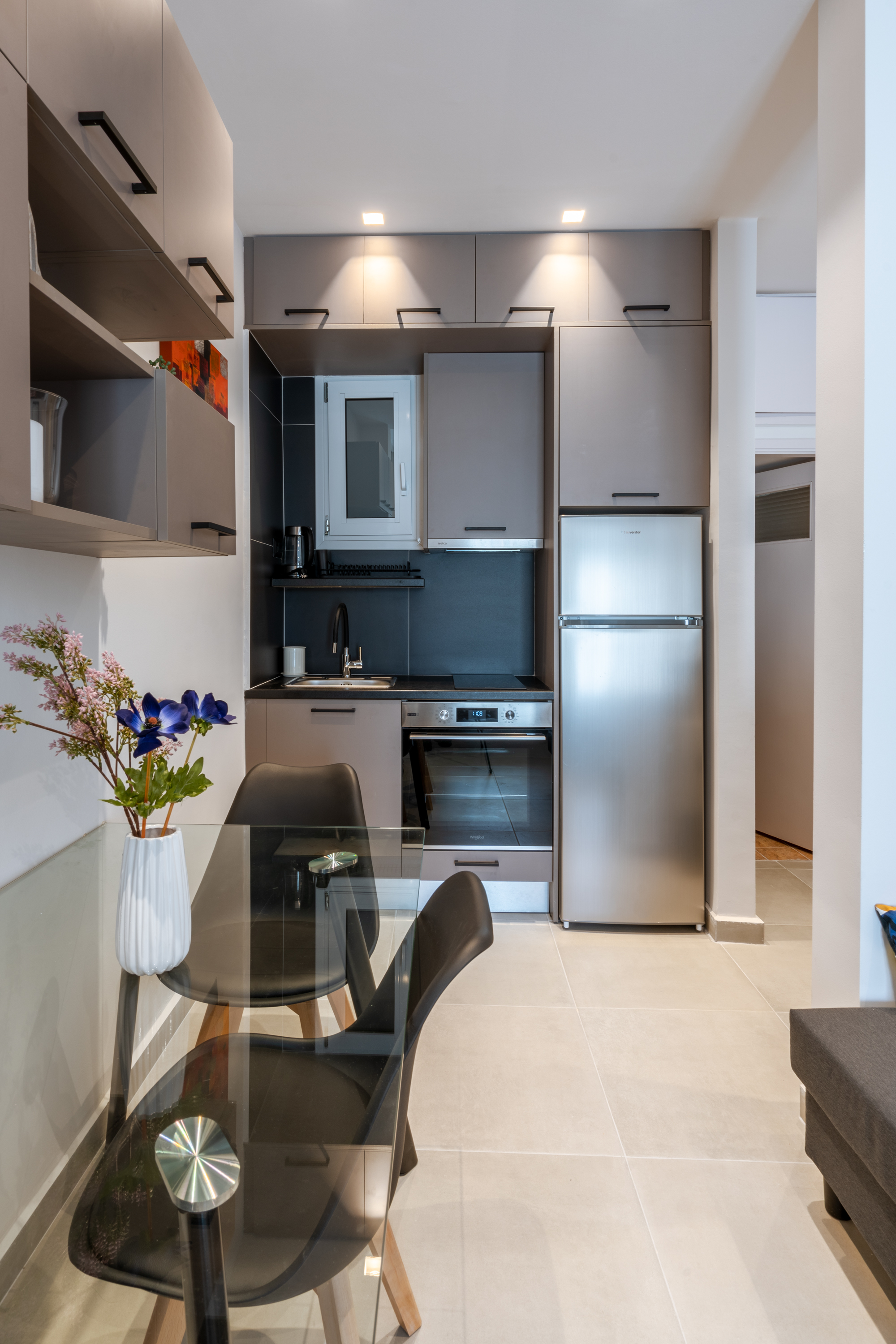 Fully equipped open kitchen in Neos Kosmos studio apartment
