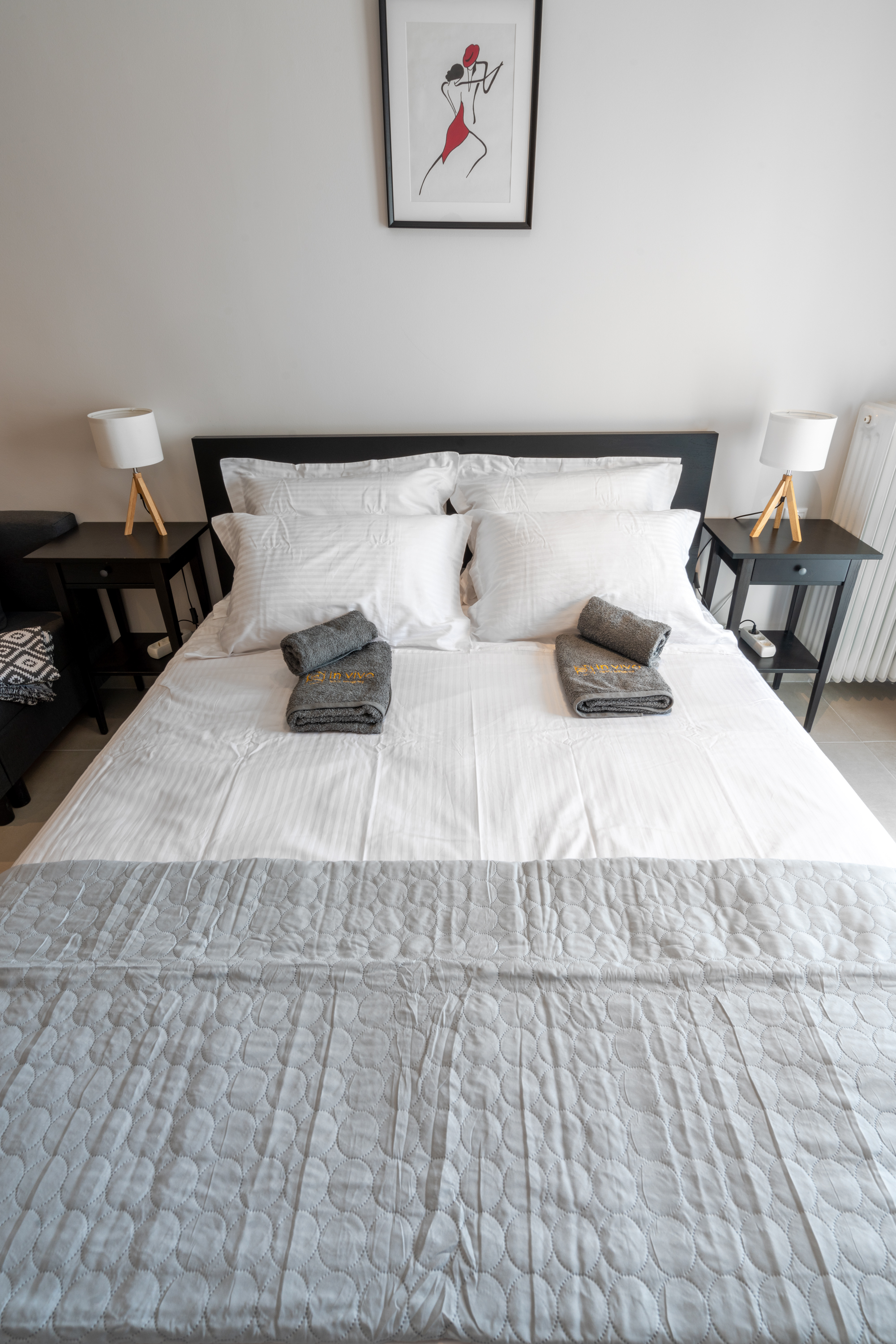 Comfortable queen size bed with fresh linens