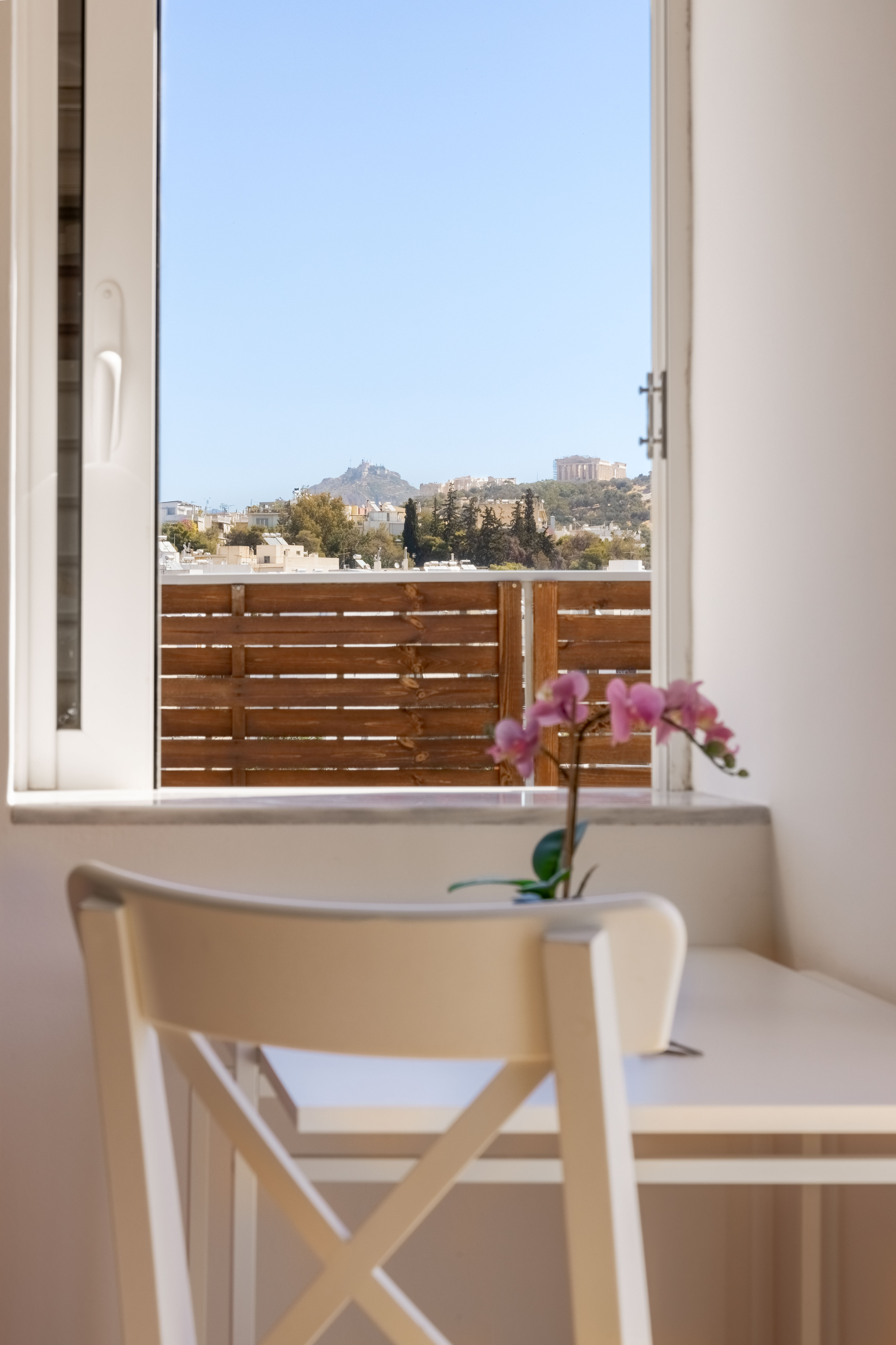 Dining area with table setting and natural light