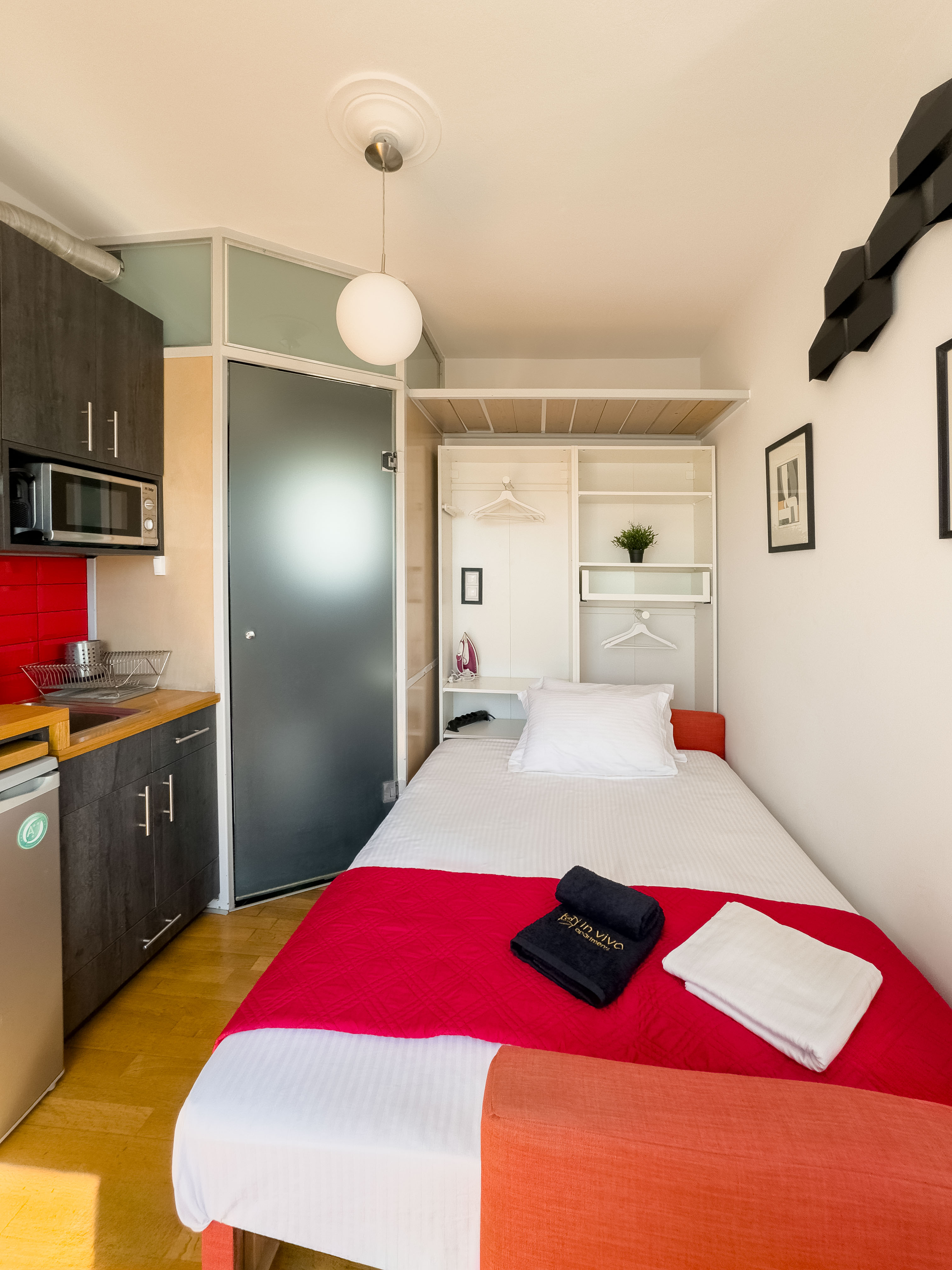 Bedroom area with quality bedding and storage